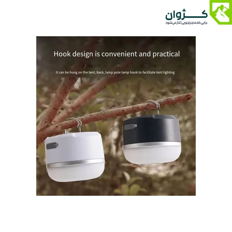 چراغ سفید و مشکی M1 آویزان شده روی شاخه در طبیعت
