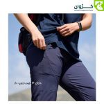 نمای بغل از قسمت جیب شلوار ترکینگ پوشیده شده توسط فردی در طبیعت