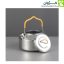 کتری استیل 0.9 لیتری با درب باز، روی زمینه طوسی هم‌خوان با رنگ بدنه.