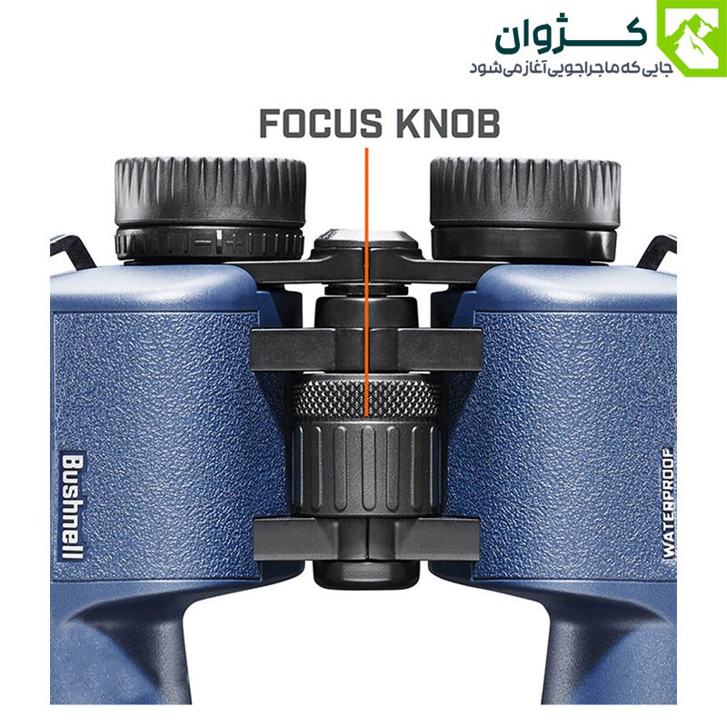 نمای نزدیک از مرکز دوربین Bushnell H2O با تمرکز بر دکمه فوکوس مرکزی