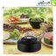 کتری کمپینگ ۱ لیتری BLACK DEER مدل K02 رنگ مشکی در کنار خوراکی‌های پیک‌نیکی، مناسب برای سفرهای طبیعت‌گردی